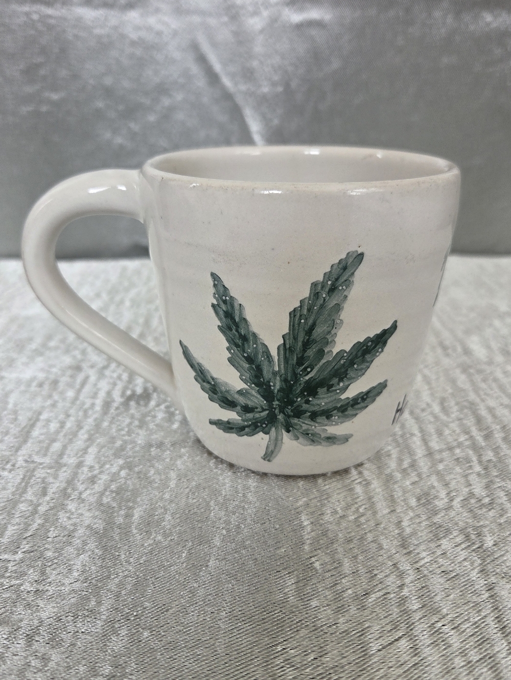 Hand-Painted White Ceramic Mug with Green Hemp Leaf